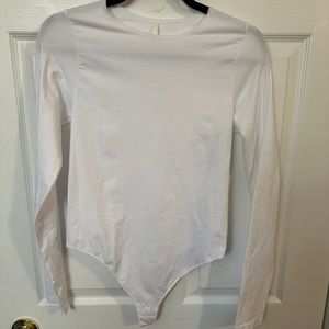 Babaton white crewneck long sleeve bodysuit, never worn, size L